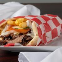 Lamb Gyro · With tzatziki, onion, tomato and French fries on a pita. Add fries for an upcharge.