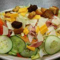 Chef Salad · Ham and turkey with provolone and cheddar cheese, carrots, tomatoes, and cucumbers on a fres...