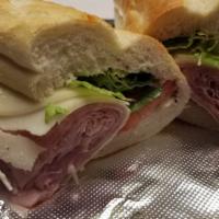 Italian Cold Cut Sandwich · Mortadella, proscuittini, salami, capicollo, provolone, lettuce, tomato, oil and vinegar.