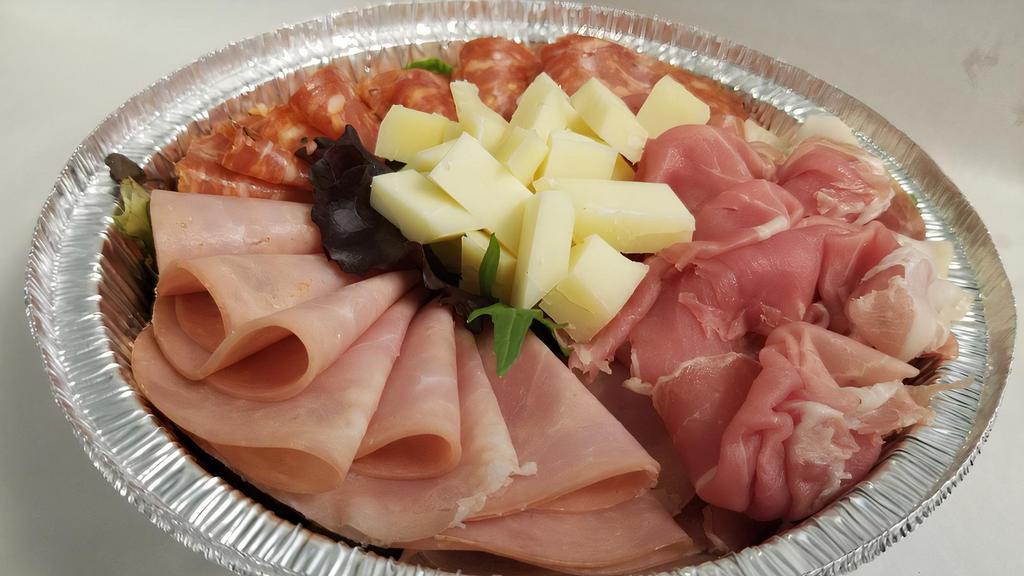 The Butcher'S Block · Assorted sliced  Italian cured meats & and cubed cheeses.