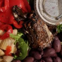 Mixed Green Salad · Spring mix lettuce, roasted peppers, grilled mushrooms, artichokes, kalamata olives with a b...