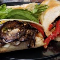 Verde Sandwich · Roasted peppers, mushrooms, romaine lettuce, olive spread, 
 artichokes and sharp provolone.