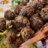 Arnavut Ciger · Fried calf's liver cubes served with spicy onion salad.
