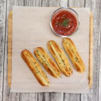 Cheese Breadsticks · Four pieces with marinara.