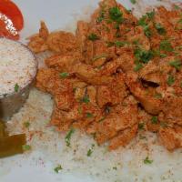 Chicken Shawarma · A healthy portion of our famous chicken shawarma served with garlic paste, rice and one side...