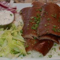 Gyros · A healthy portion of our famous gyros meat served with tzaziki sauce, rice and one side of y...