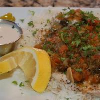 Grilled Tilapia · A delicious tilapia filet grilled and smothered with our special mixture of cilantro, tomato...