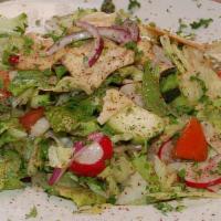 Fattoush · A mix of romaine and iceberg lettuce, cucumbers, tomatoes, mint, onions, radish, and parsley...