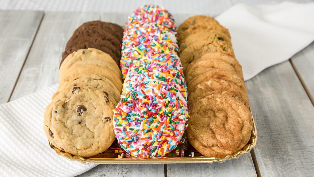 3 Dozen Assorted W/ Frosted Sprinkles Tray · Tray includes: 2 dozen 3-inch assorted cookies , plus 1 dozen 3-inch sugar cookie frosted white w/sprinkles. Sprinkle colors vary with season.  Select up to 6 flavors for the 2 dozen  assortment.