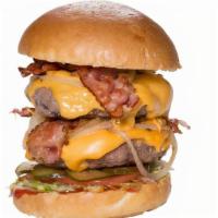 Superman · Double burger topped with American cheese, grilled onion, bacon, lettuce, tomato, pickles, k...