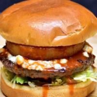 Buffalo Burger · Burger topped with blue cheese crumble, lettuce, tomatoes, buffalo sauce & onion ring