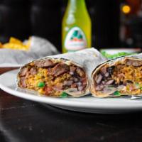 Grande Burrito · One jumbo hand‐held burrito stuffed with rice, black beans, queso blanco, pico de gallo, and...