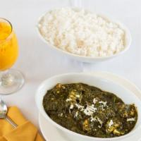 Palak Paneer · Spinach and homemade cheese cooked with Indian spices. Served with rice.