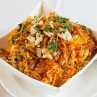 Vegetable Biryani · Specially cooked basmati rice embedded with a rich mix of vegetable curry garnished with lem...