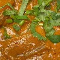 Vathal Kuzhambu · Onions and lentils cooked in a tamarind sauce. Origin state: Tamil Nadu.