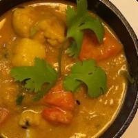 Mixed Vegetable Korma · Steamed mixed vegetables cooked in a coconut gravy with spices. Origin state: Kerala.