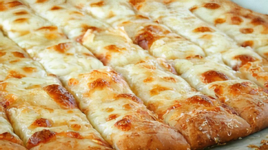 Cheesy Bread   · Garlic Sauce , Wisconsin mozzarella Cheese with Dipping Pizza Sauce .