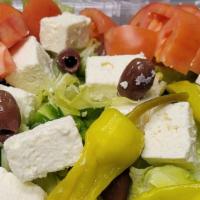 Greek Salad · Our Fresh Garden Salad+feta Cheese,Bana Pepper,Black olives.