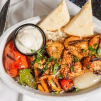 Chicken Kabob · grilled chicken with vegetables served on top of basmati rice