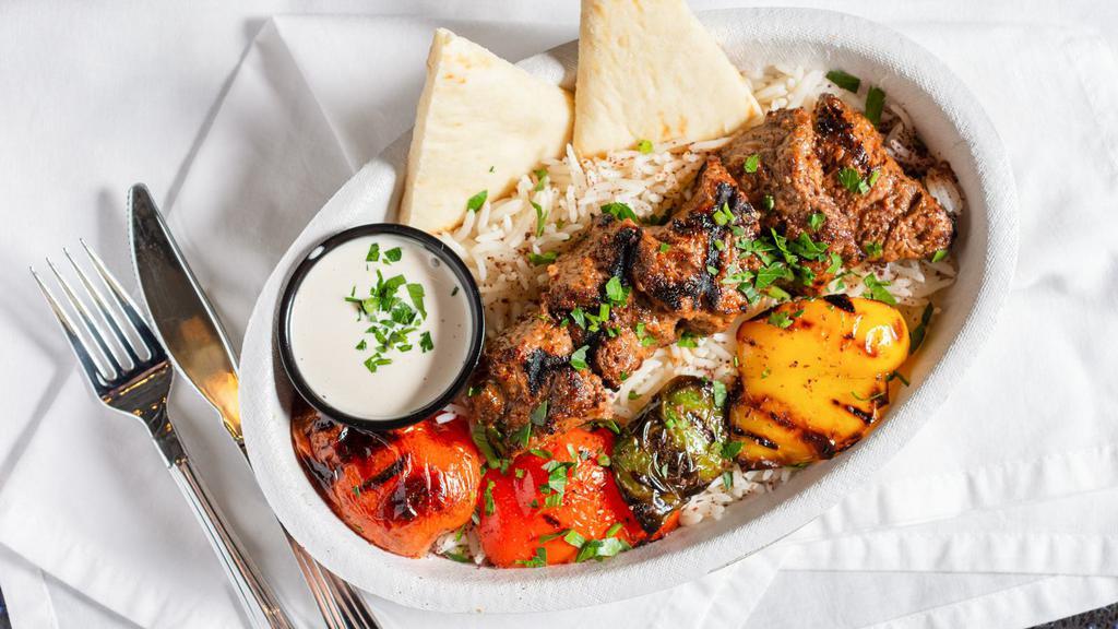 Beef Filet Kabob · grilled beef with vegetables served on top of basmati rice