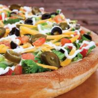 Nacho Specialty Pizza · Taco pie’s favorite cousin, the nacho pizza has a base of spicy taco sauce and refried beans...