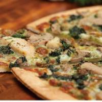 Pesto Chicken And Spinach Super Specialty Pizza · Packed with pesto flavor as a base sauce, topped with boneless grilled chicken breast strips...