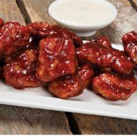 Boneless Wings · Plump, tender all-white meat boneless chicken, breaded and baked, then tossed in your favori...