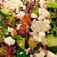The Sprigs · Romaine and mixed greens with tomato, purple cabbage, radish, cucumber, mint and feta cheese...
