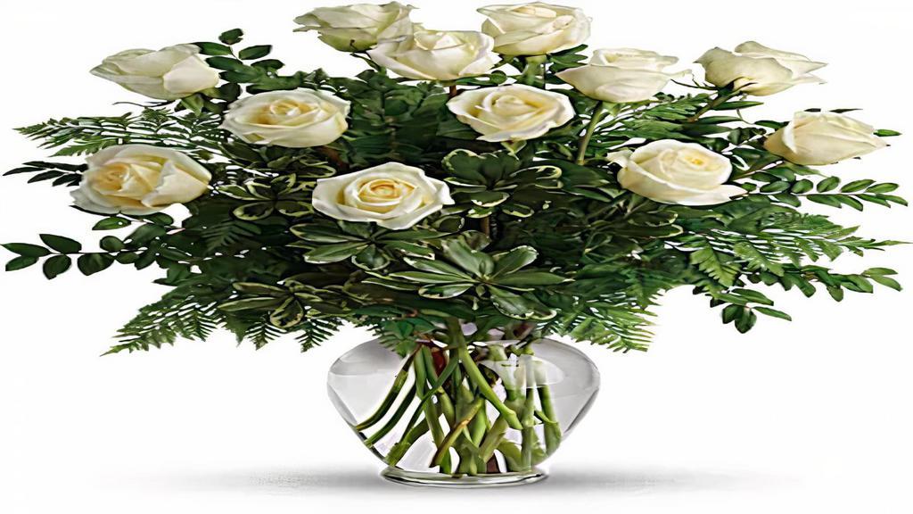 Dozen White Roses · Beautiful longstem white roses in a vase with greenery