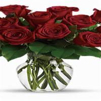 Enduring Passion · Dozen longstem red roses designed in a vase.