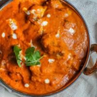 Butter Chicken · Marinated charbroiled chicken cooked in chef's secret spices.