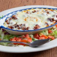 Queso Flameado · Melted Monterey Jack cheese mixed with fajita or chorizo.
Served with tortillas.