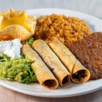 Flautas · Three beef or chicken fajita flautas. Served with rice, beans, guacamole, sour cream, and a ...