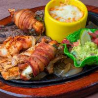 No Name Plate · Beef and chicken fajitas, chicken diablo, shrimp brocheta,
grilled shrimp & queso del mar. S...