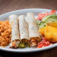 Tacos Del Mar · Three flour tortillas filled with shrimp, cheese, jalapeños and bacon. Served with sliced av...