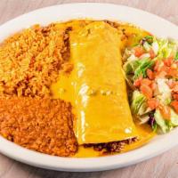 Texas Burrito · Large flour tortilla filled with ground beef, topped with chile con queso. Served with rice ...