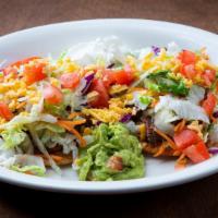 Tostadas · 2 ground beef or chicken tostadas. Served with lettuce, tomatoes, beans, cheese, sour cream ...