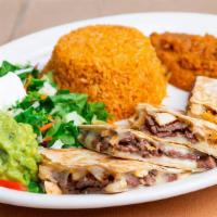Quesadilla Plate · Quesadillas stuffed with beef fajita, chicken fajita, or grilled vegetables and Monterey Jac...