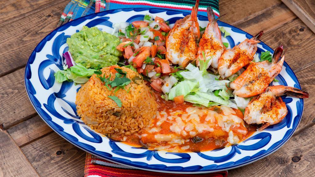 Tampiqueña Mar · 5 marinated jumbo shrimp and one cheese enchilada. Served with rice, charro beans, guacamole, and charro beans.