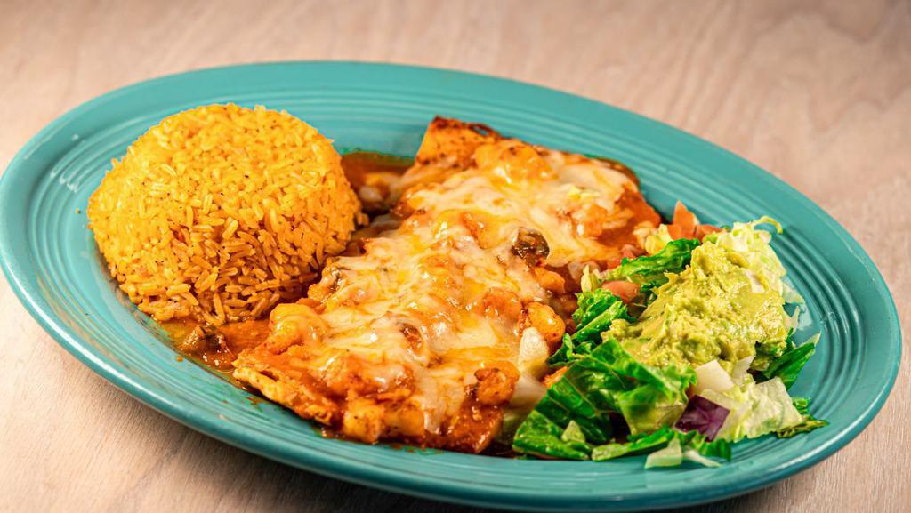 Pechuga Shrimp · Chicken breast topped with shrimp sauteed in Mexican sauce and Monterey Jack cheese. Served with charro beans, rice, guacamole, tortillas.