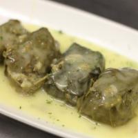 Dolmadakia (Cold) · Stuffed grape leaves with rice and herbs