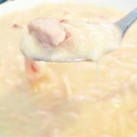 Avgolemeno Soup · Traditional Greek chicken soup with egg, lemon and orzo.