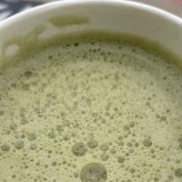 Large Matcha Latte · Matcha green tea, raw honey and oat milk.