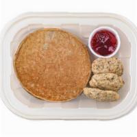 Banana Pancakes & Chicken Sausage · Two gluten free banana pancakes with three pieces of chicken sausage. Served with a side of ...