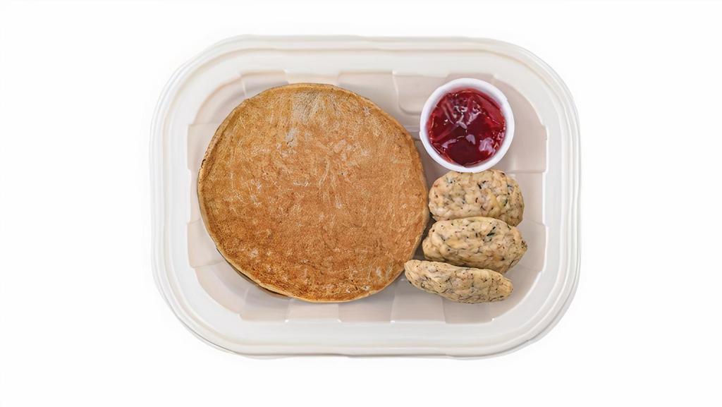 Banana Pancakes & Chicken Sausage · Two gluten free banana pancakes with three pieces of chicken sausage. Served with a side of organic strawberry jam. 
Calories: 440
Fats: 15
Carbs: 52
Protein: 26