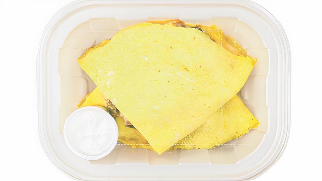 Chicken Tikka Omelette · 3 cage free egg omelet with bell peppers, onions, cheddar cheese, and South Asian style chicken breast.