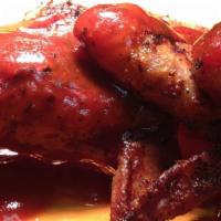 Smoked Whole Wings · Pit smoked char-grilled whole wings tossed in choice Kloby's house made BBQ sauces.