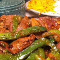 Chicken & Steak Combo Fajita · A sizzling platter of sautéed onions & peppers served w/ rice, refried beans, sour cream, le...