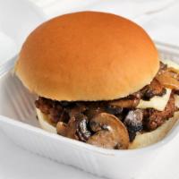 Mushroom Swiss Burger · All-natural ground beef, melted Swiss cheese topped with grilled onions and mushrooms. Optio...