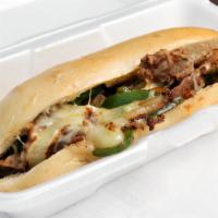 Philadelphia Sandwich · All-natural grilled steak topped with melted mozzarella cheese, grilled green peppers, and o...